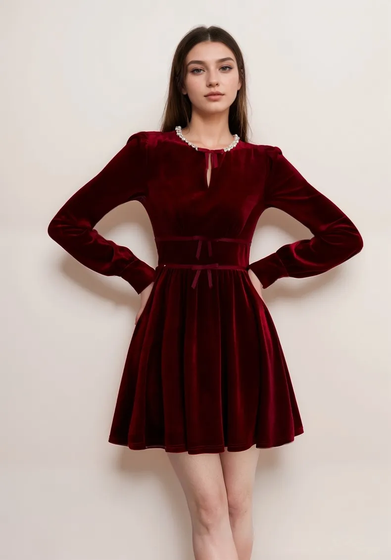 Chic Red Velvet Long Sleeve Mini Dress with Pearl Embellishments and Bow Detail