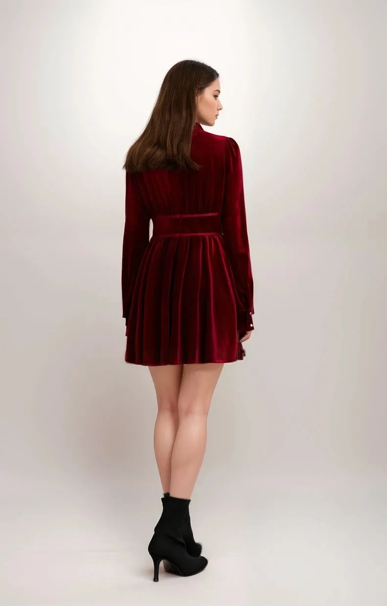 Chic Red Velvet Long Sleeve Mini Dress with Pearl Embellishments and Bow Detail