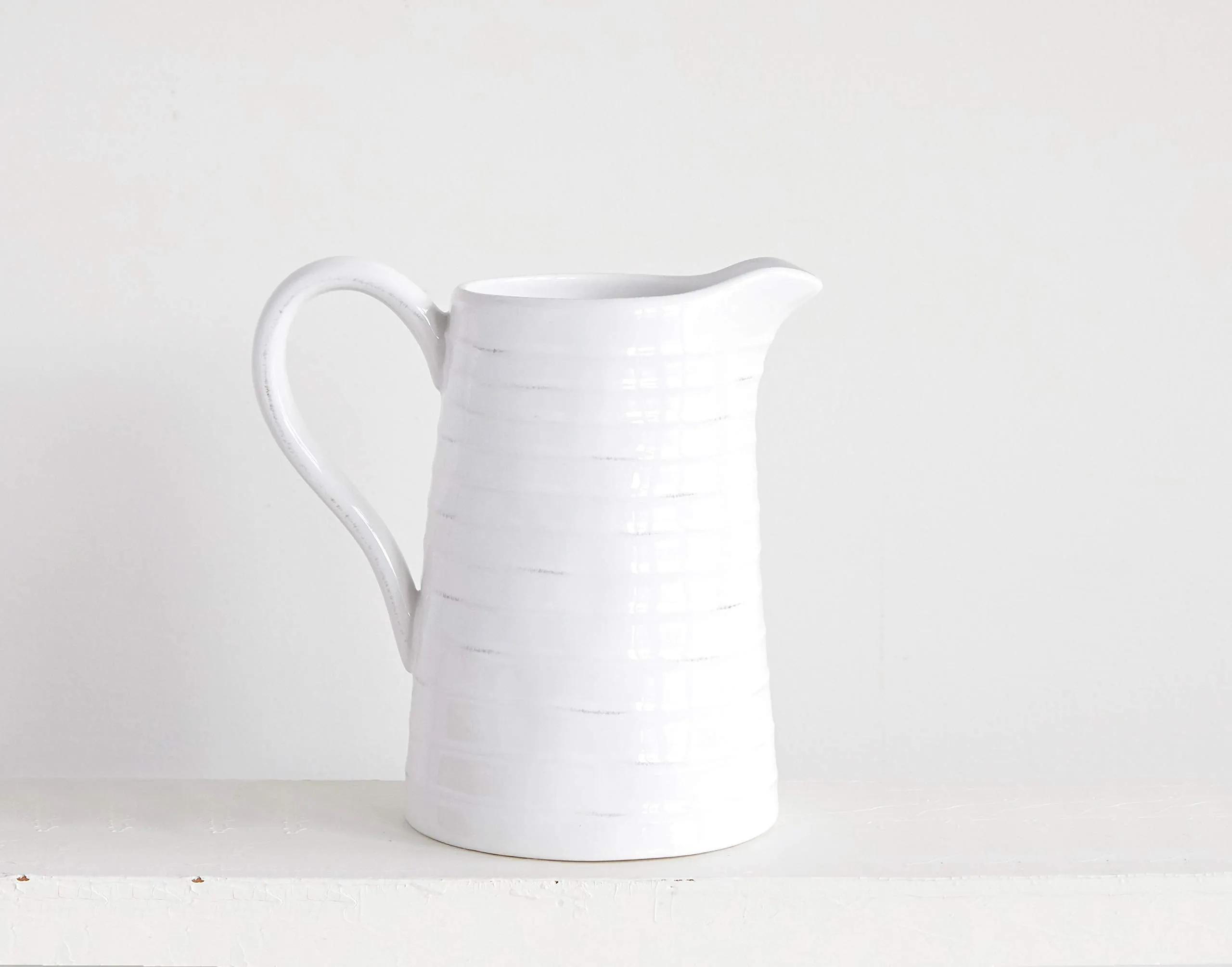 White Ceramic Pitcher by Creative Co-Op